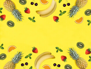 Fruit and berry on the yellow background. Copy space. Top view. Flat lay.