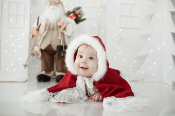Obraz na płótnie Canvas adorable baby posing with christmas theme