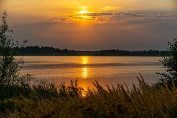 Fototapeta premium sunset over the river