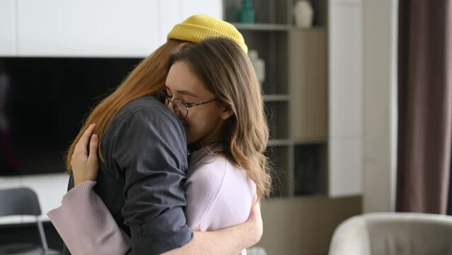 Reconciliation - guy grabs and hugs his girlfriend after looking at each other