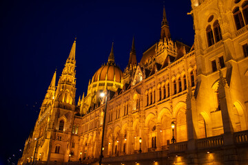 Fototapeta na wymiar Parliament building illuminated at night in Budapest, Hungary