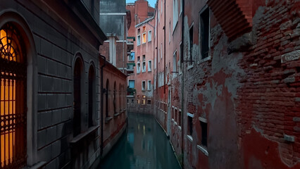 Medieval houses, narrow canals, bridges, gondolas in Venice, Italy, February 10, 2024. High quality...