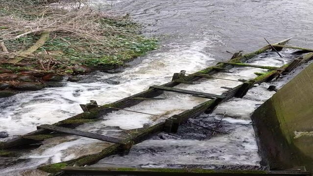 water rushes down the fish ladder in l&uuml;neburg