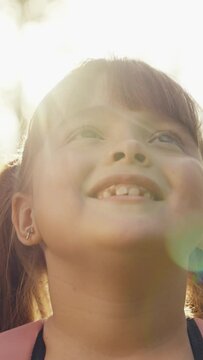 portrait smiling girl, looking sky, smile face child kid girl, child face rays sunlight, child close-up children playground, bokeh background sunset flare, family girl daughter happy dream, face sky