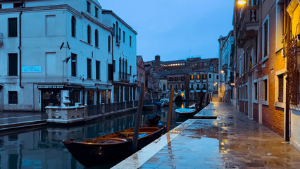 Medieval houses, narrow canals, bridges, gondolas in Venice, Italy, February 10, 2024. High quality 4k footage - obrazy, fototapety, plakaty