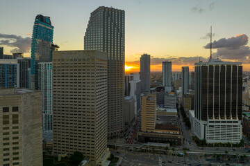 Aerial view of downtown district of of Miami Brickell in Florida, USA at sunset. High skyscraper...