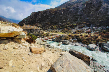 Steel ladders over the Khumbu Khola on the return route from Everest base camp trek in Nepal