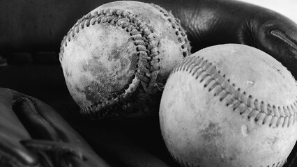 Worn and dirty game balls from baseball game with nostalgia vintage style in black and white, sports equipment closeup. - 751756058