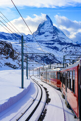 View of the Matterhorn from a window of the cogwheel train of the Gornergrat Railway descending...