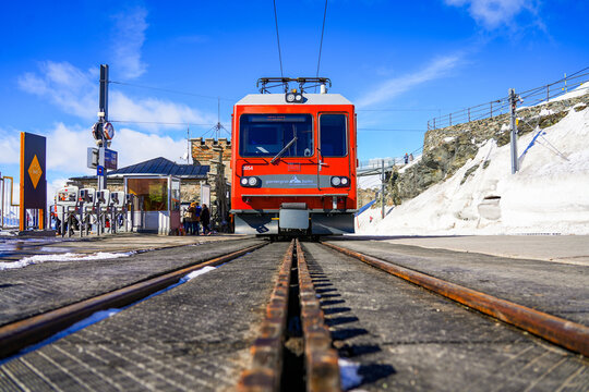 Cogwheel train locomotive at the top of the Gornergrat Railway line above Zermatt in the Swiss Alps, Canton of Valais, Switzerland - Rack rail using 2 solid bars with offset pinions