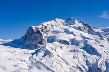 Panoramic view of the Gorner Glacier (Grenzgletscher) along with many summits of the Monte Rosa mountain range, as seen from the Gornergrat in the Swiss Alps, Valais, Switzerland