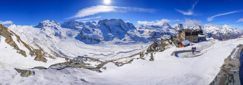 Panoramic view of the Gorner Glacier (Grenzgletscher) along with many summits of the Monte Rosa mountain range, as seen from the Gornergrat facing the Matterhorn in the Swiss Alps, Valais, Switzerland
