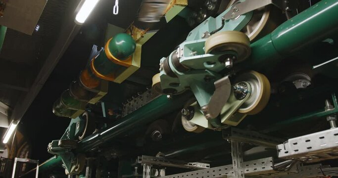 Close-up of the mechanism roller coaster along the rails.