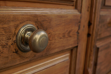 door knocker in bronce hand