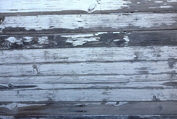 Naklejka premium Boards with peeling old gray silver white paint