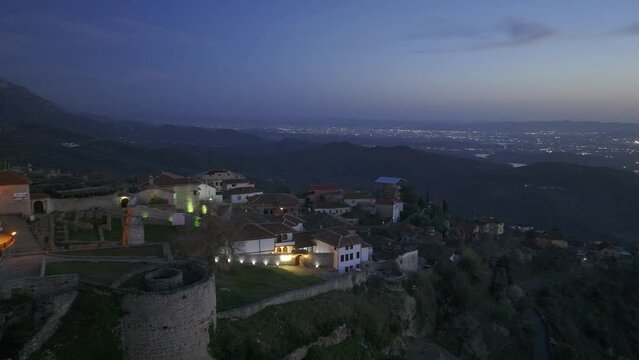 Areal view of Kruje city and castle in Albania in night sky