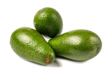 Avocados isolated on white background with clipping path. A pile of sliced avocados.