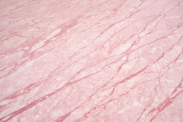 Fototapeta premium Texture of light pink veined marble floor, background or graphic element for your design or project