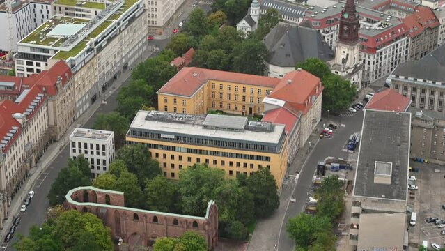 Berlin, Germany, August 15, 2023. Footage with aerial view:  in the center the ruins of the Gray Monastery church. Let's look up at the horizon.