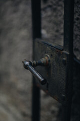 old handle of a metal wicket 