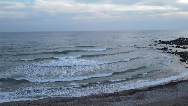 The scenic views of the sea and the waves at the beach of Side, Antalya