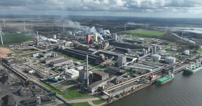 Fertilizer factory in Sluiskil in Zeeland that will transport CO2 abroad by ship for climate reasons.In the area of Ghent and Terneuzen. The Netherlands. Aerial drone view.