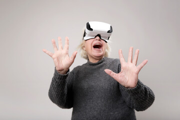 older woman with virtual reality goggles