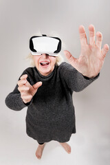 older woman with virtual reality goggles