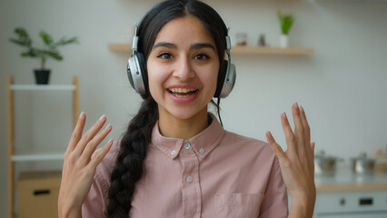 Webcam view smiling Arabian girl in headphones happy ethnic indian woman businesswoman student...