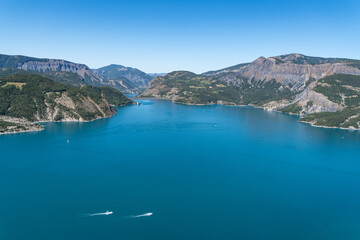 Fototapeta na wymiar Scenic panorama of the Lake of Serre-Poncon, one of the largest reservoirs in Europe, Hautes-Alpes, France