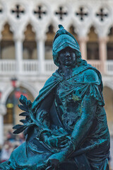 Venice, bronze statue on gates of Campanile San Marco
