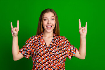 Photo of funky good mood adorable girl dressed print shirt hands showing rock symbol scream yeah...