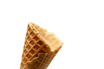 An empty waffle cone on a white background