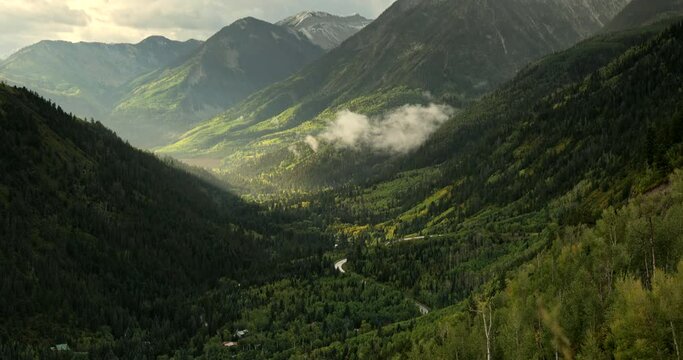 Mist rises over the forest in Rocky Mountain National Park Colorado United States