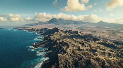 Photo sur Plexiglas les îles Canaries Aerial View of Rugged Lanzarote Coastline in the Canary Islands at Sunset