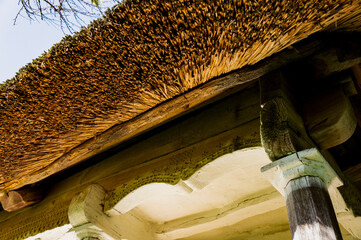 Close-up of old roof made up from reed. Natural building materials.