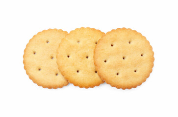 Three crispy crackers isolated on white, top view. Delicious snack
