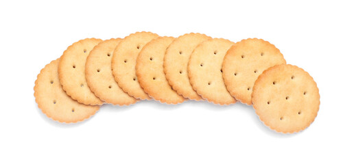 Many crispy crackers isolated on white, top view. Delicious snack