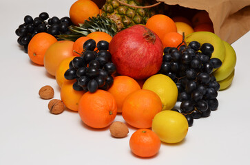 different types of tropical fruits and paper bag, fresh food delivery