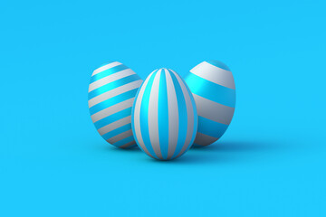 Three easter eggs on blue background. Religious holiday. 3d render