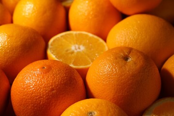 Tasty ripe fresh oranges as background, closeup