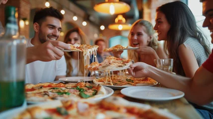 Foto op Canvas Photo of a group of friends eating pizza together, seated at a table in a cozy pizzeria. Fragrant pizza is divided into portions, eagerly awaiting to be savored in the delightful company of fellows © dianacrimea