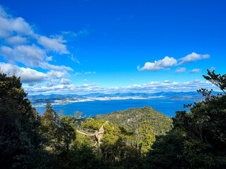 Fototapeta na wymiar Miyajima, Itsukushima island, Japan - 13.11.2023. Mountain Misen observatory in Miyajima island, Hiroshima prefecture, Japan. Beautiful scenery from Mount Misen Observatory, Miyajima, Hiroshima, Japan