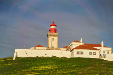 Fototapeta na wymiar Lighthouse on the westernmost cape of the Eurasian continent Cabo da Roca, Portugal. High quality photo