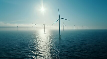 Fototapeta premium Windmill park in the ocean, drone aerial view of windmill turbines generating green energy electric,