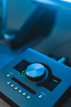 Close-up of audio mixing equipment at a studio session