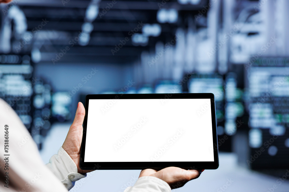 Poster close up shot of mock up tablet used by professional in server room delivering massive computing pow