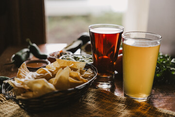 Beer and chips and guacamole