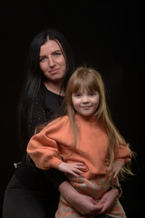 mother and daughter studio portrait happy family 6