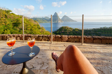 Woman enjoying the views of Piton Mountains ..Soufriere, Saint Lucia, .West Indies, Eastern Caribbean